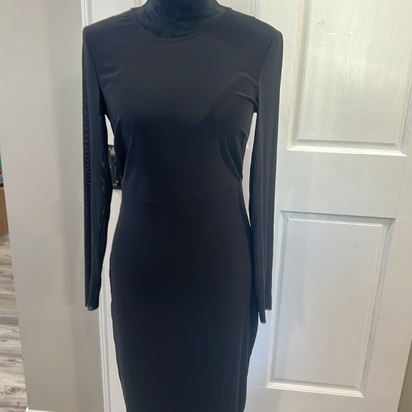 ⭐️SOLD⭐️ Bebe s black dress w/built-in bra,sheer sleeves, and open back. - Picture 3 of 8